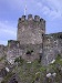 Conwy castle single turret with flag pole wales welsh uk